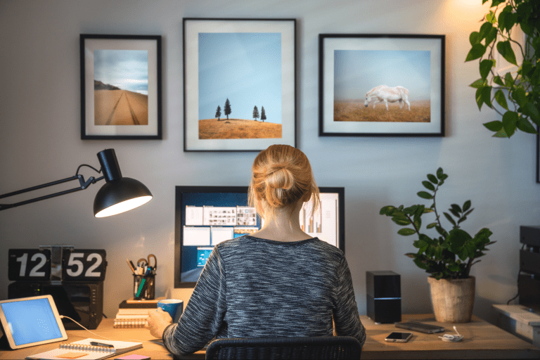 A small business owner working from home using remote workforce technology